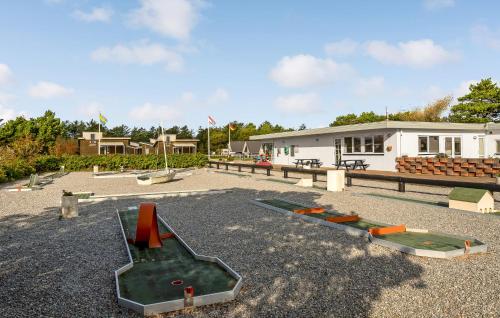 a group of playground equipment in front of a building at Beautiful Home In Vestervig With Wifi in Vestervig