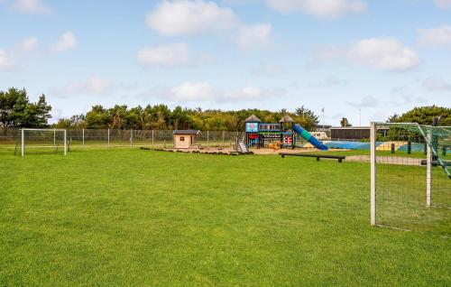 a park with a playground with a goal at 1 Bedroom Awesome Home In Vestervig in Vestervig