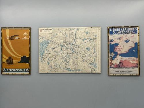 three framed maps are hanging on a wall at Hotel Goiânia Palace in Goiânia
