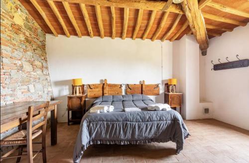 Ένα ή περισσότερα κρεβάτια σε δωμάτιο στο The House , Tuscany and the pool