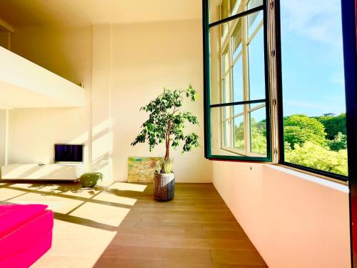 Photo de la galerie de l'établissement Spacious Loft in Paris with Stunning View, à Paris