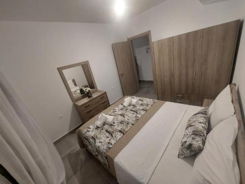 Ένα ή περισσότερα κρεβάτια σε δωμάτιο στο Irina's Apartment 2