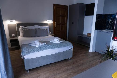 Postel nebo postele na pokoji v ubytování Apartments Dida Šime