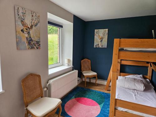 Postel nebo postele na pokoji v ubytování le Lombry