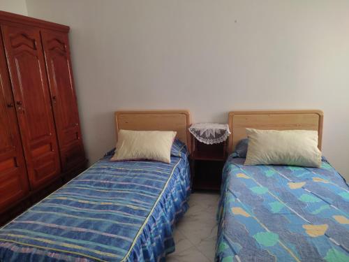 Una cama o camas en una habitación de Peaceful Apartment