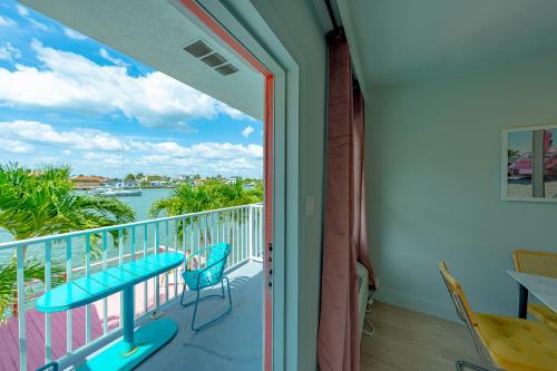 a balcony with a view of the water at Tropical Breeze in Clearwater Beach