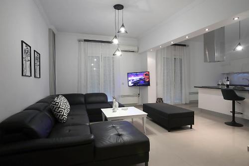 TV a/nebo společenská místnost v ubytování Estia Luxury House