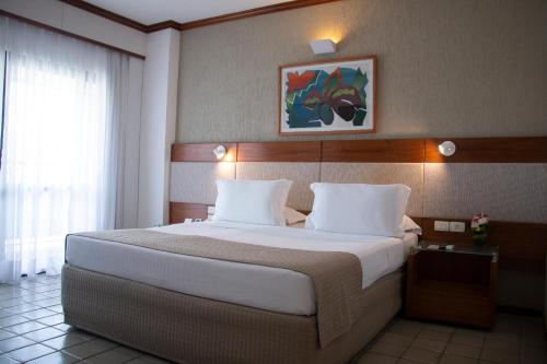 Postel nebo postele na pokoji v ubytování Mar Hotel Conventions