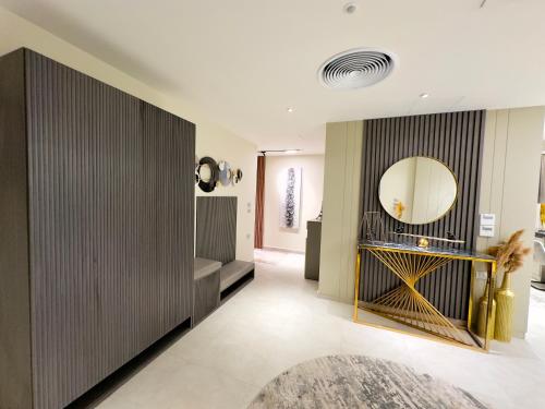 a bathroom with a large mirror and a sink at Private house Sheikh Zayed Egypt in 6th Of October