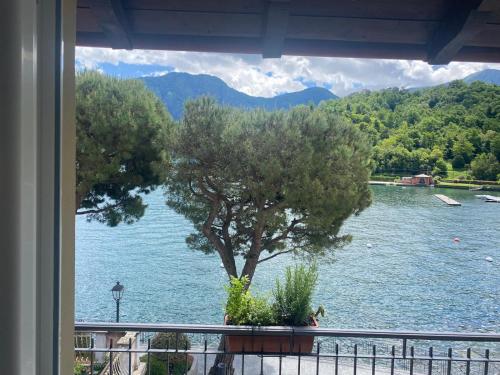 a view of a lake from a balcony at La casa sul lago in Lenno