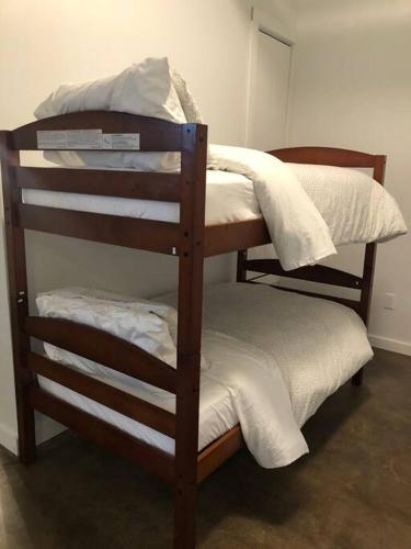 a couple of bunk beds in a room at Main Office Lofts Building - 4 lofts in Lynchburg