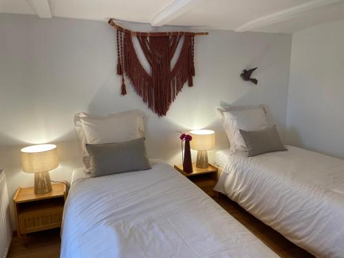 Postel nebo postele na pokoji v ubytování Gîte L'instant Vosges