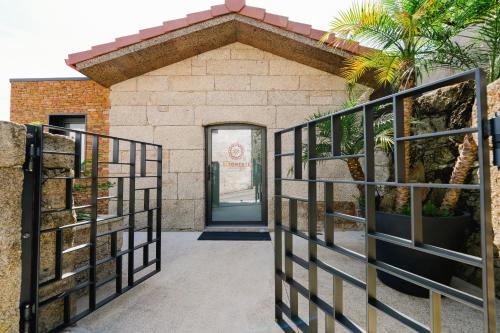 an entrance to a building with a gate at ALTAMENTE - Alojamento Local in Viana do Castelo