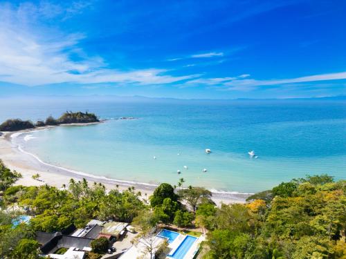 an aerial view of a beach and the ocean at Deluxe Apt with Ocean View & Beach Access only 1 hour drive from San Jose in Puntarenas