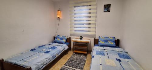 Postel nebo postele na pokoji v ubytování Apartment Belis Utjeha