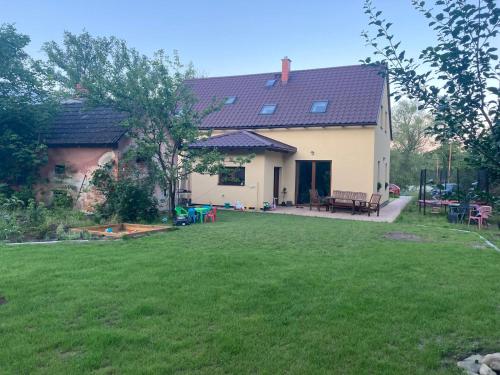 a house with a lawn in front of it at Na břehu Těrlicka in Horní Těrlicko
