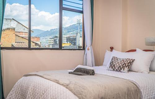 Postel nebo postele na pokoji v ubytování UKUKU Hostel