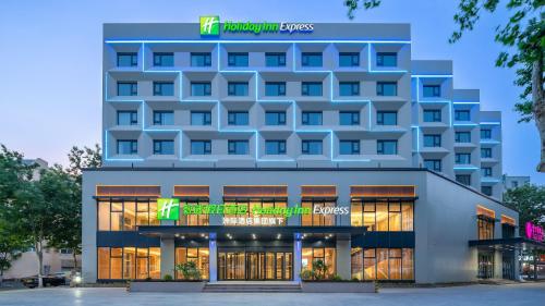 a rendering of the front of a hotel at Holiday Inn Express Qingdao Shibei by IHG in Qingdao