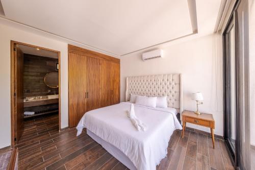Nimue Marina Residenceにあるベッド
