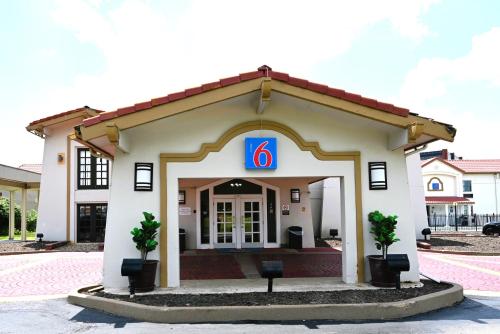 a building with a number on it at Motel 6-Hazelwood, MO in Hazelwood