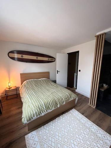 Postel nebo postele na pokoji v ubytování Le Duplex de la côte