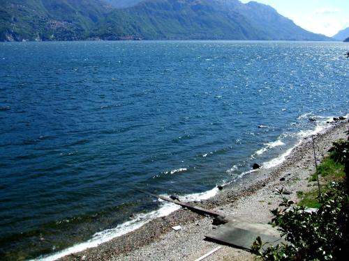 a rocky shore of a body of water at Garden Rooms 1 in Menaggio