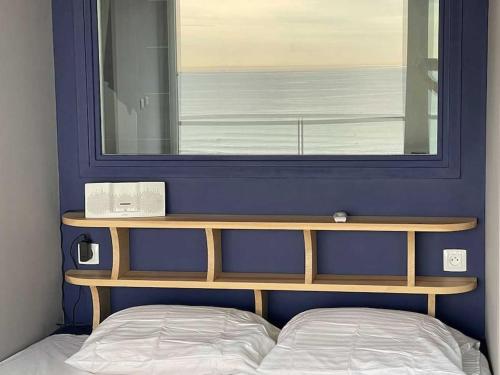 En eller flere senge i et værelse på Cocon zen, face mer, plein ciel