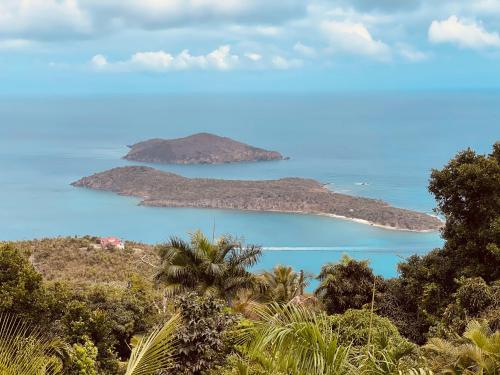 a view of two islands in the ocean at Private Oasis with Incredible Views in St Thomas