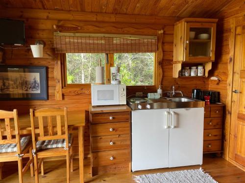Kuchyň nebo kuchyňský kout v ubytování Kaldbaks-kot cottages
