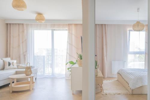Postel nebo postele na pokoji v ubytování Apartamenty Deluxe