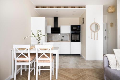Kuchyň nebo kuchyňský kout v ubytování Apartamenty Deluxe