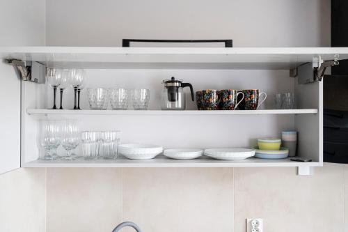 Kuchyň nebo kuchyňský kout v ubytování Apartamenty Deluxe