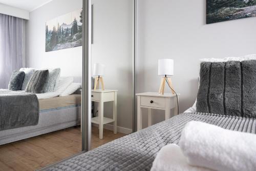Postel nebo postele na pokoji v ubytování Apartamenty Deluxe
