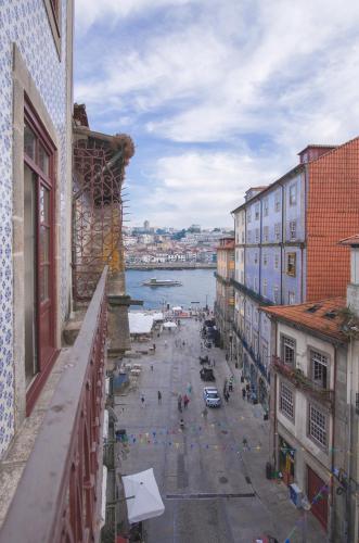 a view of a street in a city with buildings at VC Heritage Ribeira Porto in Porto