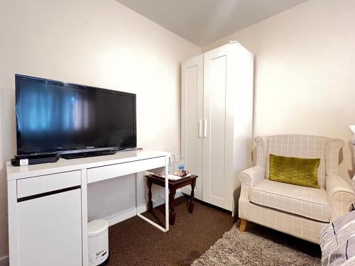 TV a/nebo společenská místnost v ubytování Residence Solitaire