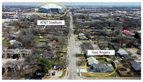 an aerial view of a neighborhood with a house and a stadium at 4BR 2,5BA Holiday Home in the Heart of Cowboy Nation in Arlington