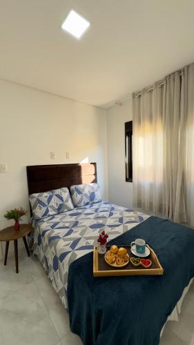 Katil atau katil-katil dalam bilik di Apto Girassol - 2 Quartos, Apto moderno,confortável e de frente para avenida principal!