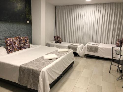 Postel nebo postele na pokoji v ubytování LUXURY Hotel