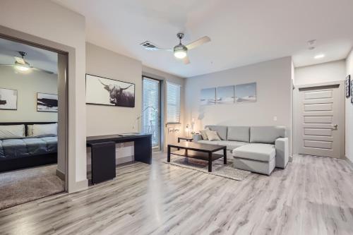 a living room with a couch and a table at Cozy 2-bedroom apartment in lovely Austin in Austin