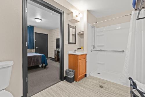a bathroom with a toilet and a sink and a shower at Lost Trail in Lava Hot Springs