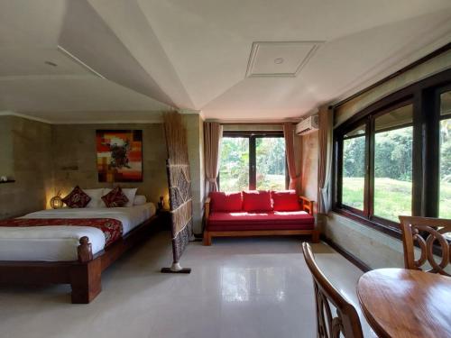 Ένα ή περισσότερα κρεβάτια σε δωμάτιο στο Dzawani Ubud