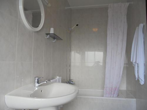 Kylpyhuone majoituspaikassa Hostal Athlanta