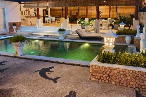 Πισίνα στο ή κοντά στο Cemara 1 BR Quirky Garden Room Single JU48