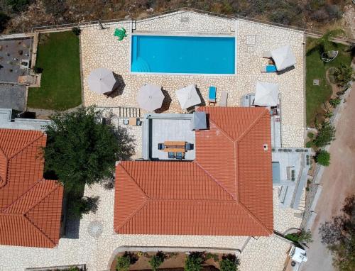 an overhead view of a house with an orange roof at Irini Villa by Elrin Villas Mani in Neokhórion