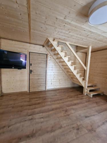 Televisyen dan/atau pusat hiburan di Nocleg Kurpiowska Kraina- Taniej przy dłuższym pobycie