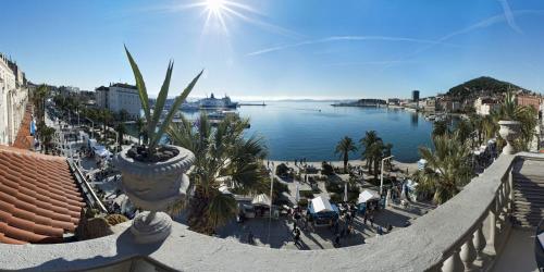 a view of the water from a balcony at Riva Luxury Suites in Split