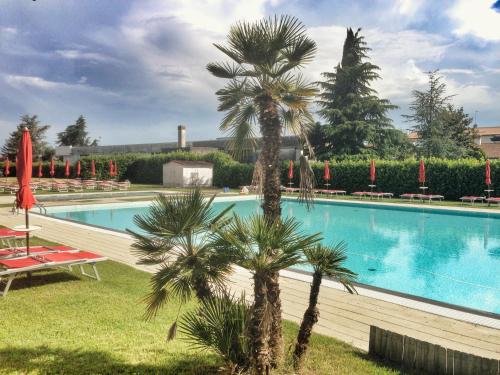 Bazén v ubytování Hotel Ca' Brugnera nebo v jeho okolí