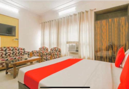 Μια τηλεόραση ή/και κέντρο ψυχαγωγίας στο Hotel Vashistha