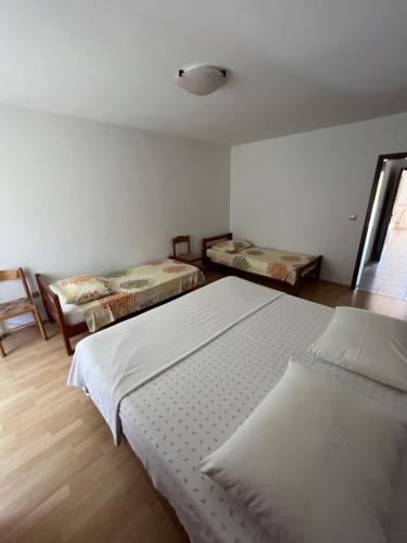 Katil atau katil-katil dalam bilik di Apartments Klabjan