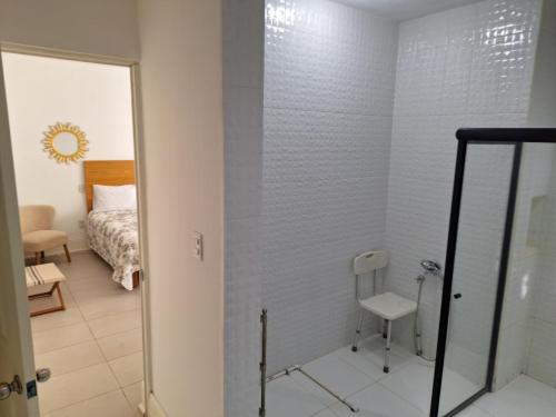 Ein Badezimmer in der Unterkunft Casa de las Dunas